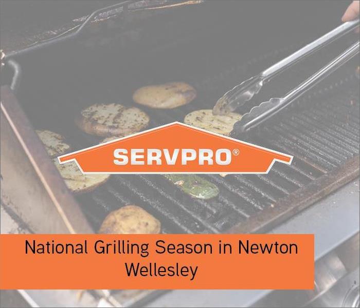 Grill with meat on it with orange box and SERVPRO logo 