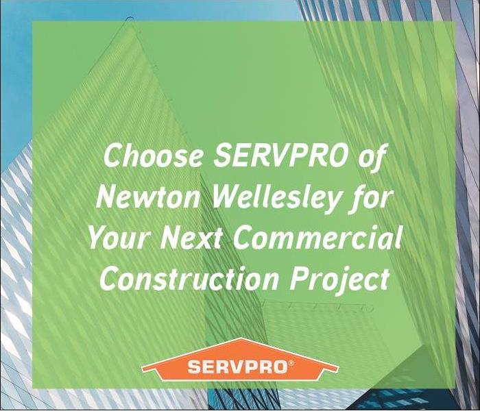 building with green overlay and text with SERVPRO orange logo